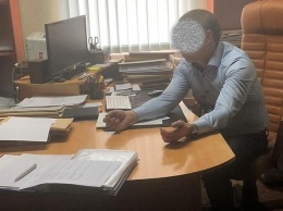 В Николаеве директора БТИ, попавшегося на взятке 108 тыс грн, отпустили домой
