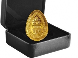 В Канаде выпустили золотую монету в форме украинской писанки