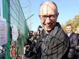 Потратили миллиард: Стена Яценюка требует еще больше денег