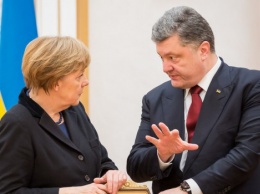Порошенко и Меркель выступили за введение на Донбассе "пасхального перемирия" с 18 апреля