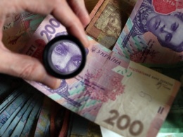 В Киеве четверть получателей монетизированных субсидий не оплатили жилкомуслуги
