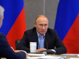 Путин испытывает Зеленского упрощением гражданства РФ жителям Донбасса - The Guardian