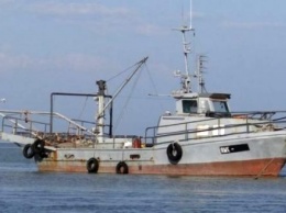 Задержанные в России украинские рыбаки вернулись на родину