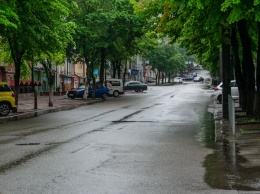 Мокрый Днепр: городские улицы залило дождем