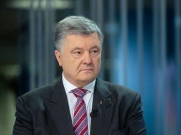 Порошенко: Санкции - это мотивация для Путина сидеть за столом переговоров