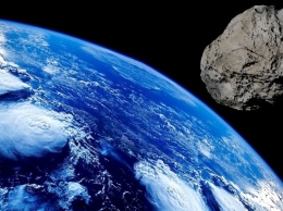 В ближайшие выходные мимо земли пролетит потенциально опасный астероид с собственным спутником
