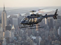 Упавший на небоскреб в Нью-Йорке вертолет сняли на видео за миг до катастрофы