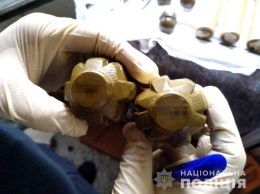 В Киеве в квартире главбуха обнаружили сумку с боевыми гранатами и патронами. Фото