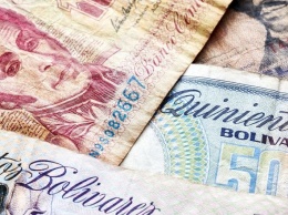 Центробанк Венесуэлы «дорисовывает» на банкнотах нули из-за инфляции