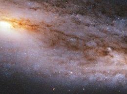 Астрономы показали необычный снимок спиральной галактики от "Хаббла"