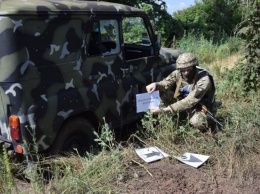 Полицейский автомобиль попал под минометный обстрел на Донетчине: ранены двое патрульных