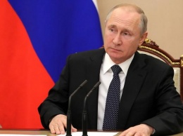 Путин готовит почву для новой рокировки с премьерством - Bloomberg