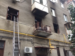 В центре Харькова женщина стояла на балконе и просила о помощи (фото)