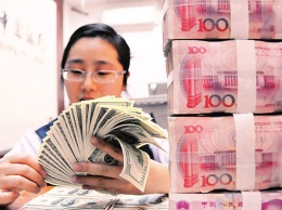 Китай снизил курс юаня до нового минимума за 11 лет