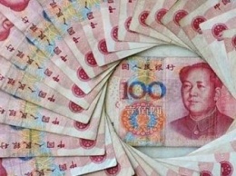 Курс китайского юаня упал до 11-летнего минимума