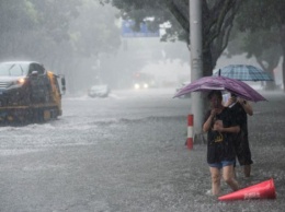 В Китае в результате тайфуна погибли по меньшей мере 13 человек