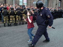 На митингах за свободные выборы в РФ силовики задерживали детей и людей с инвалидностью