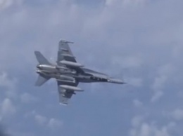 Российские Су-27 отогнали истребитель НАТО от самолета министра обороны Шойгу. ВИДЕО
