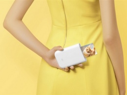 Xiaomi Mi Pocket Photo Printer печатает фото с мобильных устройств
