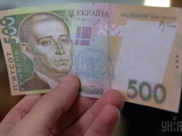 Фальшивые деньги гуляют по Харькову. Как отличить подделку (фото)