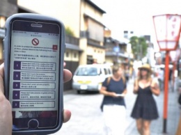Киото напоминает иностранным туристам об этикете через смартфон