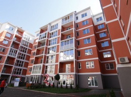 Тринадцать семей из Днепра получили квартиры по программе "Доступное жилье"