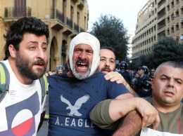 В Бейруте протестующие устроили живую цепь длиной 171 километр