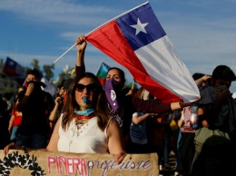 В Чили люди вышли на новые протесты в память о погибших во время местного метромайдана