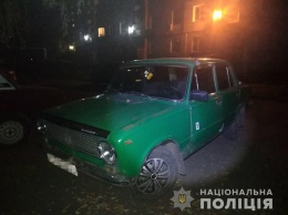 В Харьковской области отца с сыном избили посреди улицы (фото)