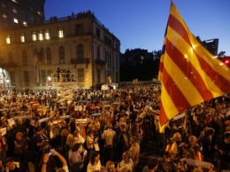 В Каталонии протестующие жгли портреты короля Испании накануне его визита