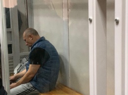 Жена киевского стрелка заявила, что делала перевязку подстреленному соседу, "пока его друзья снимали кино"