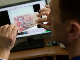 В Украину хлынули потоки фальшивых денег: эксперты рассказали, как распознать подделку