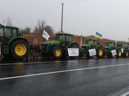В разных частях Украины аграрии протестовали против продажи земли