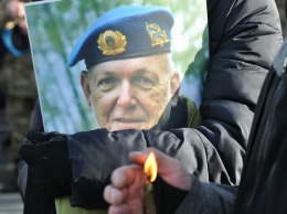 Киев простился с ветераном АТО, избитым до смерти своим пасынком