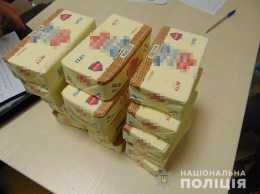 В Киеве женщина украла из супермаркета масло на 1500 гривен и хотела его перепродать