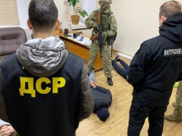 В Запорожье полиция с БТРами задерживала членов опасной ОПГ: фото и видео