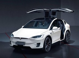Сможет ли дизельный пикап Ford F-250 перетянуть электрический кроссовер Tesla Model X?