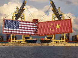 В свете торговой войны с Китаем для США противостояние с Москвой стало второплановым - эксперт