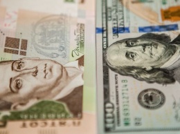 НБУ повысил официальный курс доллара на новогодние праздники