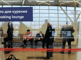 Путин подписал закон о "курилках" в аэропорту
