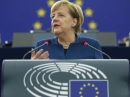 Меркель в новогоднем послании призвала к борьбе с изменением климата