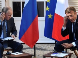 Украина стала предметом разговора Путина с Макроном