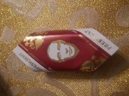 С Путиным на этикетке, с водкой внутри. В РФ в детские подарки положили такие конфетки (ФОТО)