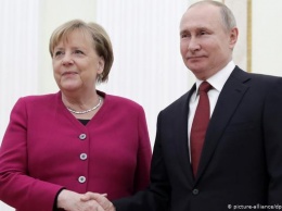 Комментарий: Меркель и Путин - не друзья, но партнеры