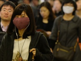 Американские аэропорты начинают проверять китайцев на наличие неизвестного вируса