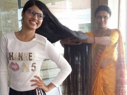 Обиделась на парикмахеров: индийская девушка обновила рекорд по длине волос