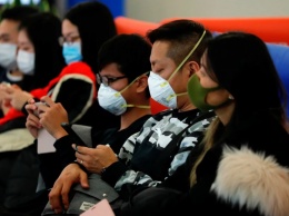 В Китае закрыли 13 городов из-за смертельного вируса