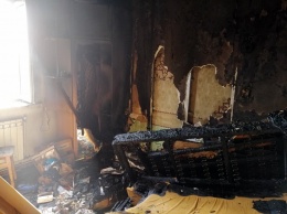 Под Днепром в доме сгорели мужчины, во дворе нашли повешенную женщину