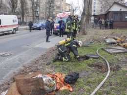 В Киеве в люке теплотрассы нашли три трупа