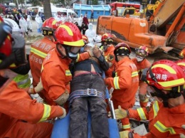 В Китае возросло количество погибших под завалами отеля